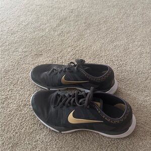 Nike Men's Black Athletic Shoes with Gold Accents